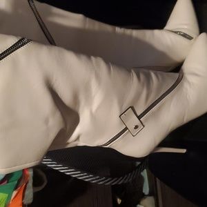 Thigh high, cream zippered stilletto Emersyn WC grown and sophisticated boots.